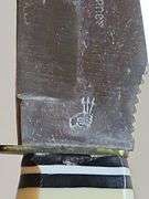 Original Buffalo Skinner knife from Silver Springs Florida with imitation bone handle and leather sheath.