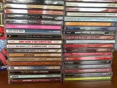 2 boxes full of CD’s…..all type of music….see all pics