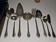 William Rogers silver plate Remembrance pattern flatware. Six piece place setting service for eight (missing two soup spoons) 8 serving pieces. Includes chest.