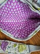 Vera Bradley purple yellow and blue flower laptop bag.