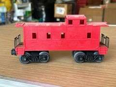 Lionel Trains Red Plastic Caboose…..needs cleaned from being stored in attic