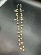 Adjustable waist size iridescent pearl-like beaded belt with charms