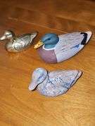 Three collectable ducks.