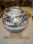 Gorgeous 9x9 intricately carved American Indian round vase...