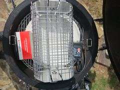 Red Kamado Joe Grill on rollaround iron stand w/cover and some like new accessories...