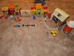 Fisher Price Little people playsets as shown. See all photos. Some pieces have some melting from attic storage as seen on elephant in last photo.