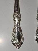 Silver plate salad servers cold meat fork and serving spoon.