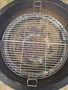 Red Kamado Joe Grill on rollaround iron stand w/cover and some like new accessories...