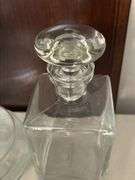 (2) very nice looking clear glass decanters…..left is unmarked (10–/4 tall) and right is Pottery Barn (9” tall)