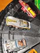 Vintage Hot wheel carrying case and cars as shown. Four redline wheels in this grouping.