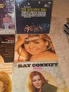 Grouping of albums by Judy Collins, the Kingston trio, Andre Kostelanetz, Ray Conniff, and more.