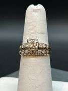 Unmarked 1-piece wedding ring set…..could not find any markings to indicate gold value…size 5-3/4