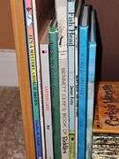 Bookcase and great grouping of children's books. Bookcase is 21.25 X 10.75 x 28.25 in tall. See all photos for titles.