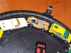 Vintage Hot wheel carrying case and cars as shown. One redline wheel in this grouping. Dukes of Hazzard car is Ertl.