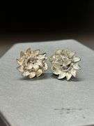 Great selection of vintage screw-back and clip-on earrings, along with a cylindrical gold tone brooch