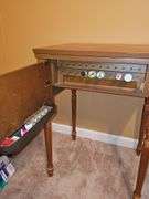 Vintage Sears Kenmore sewing machine in cabinet with storage chair. Closed cabinet is 22.5x18 X 30 in tall. Chair is 16 X 13 X 27.5 in tall. Seat height is 17 in