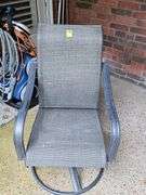 Spring action outdoor rocker.