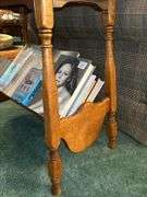 Vintage side table with bottom magazine rack…..26 x 13 x 23 tall