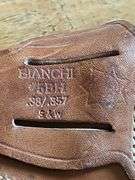 Pachmayr grips, holsters, and ear protection.