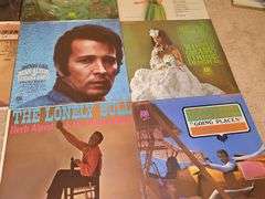 Grouping of albums by David McCallum Ray Conniff, Sergio Mendes, Herb Albert and the Tijuana brass.