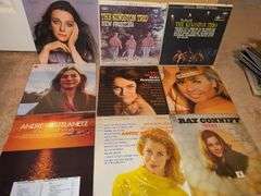 Grouping of albums by Judy Collins, the Kingston trio, Andre Kostelanetz, Ray Conniff, and more.