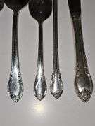 William Rogers silver plate Remembrance pattern flatware. Six piece place setting service for eight (missing two soup spoons) 8 serving pieces. Includes chest.