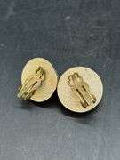 Great selection of vintage screw-back and clip-on earrings, along with a cylindrical gold tone brooch