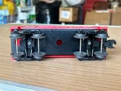 Lionel Trains Red Plastic Caboose…..needs cleaned from being stored in attic
