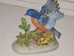 Lefton China goldfinch, unmarked bluebird, and terracotta look rabbit.