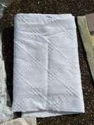 Wide variety of table linens and 1 new bath rug…..sizes unknown