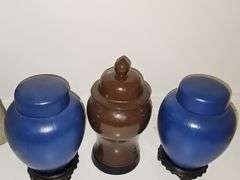 Three ceramic urns. 9.25 in and 11.25 in tall.