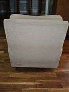 Tan manual rocker recliner. 30 x 33.5 x33 in tall. Seat height is 19 in.