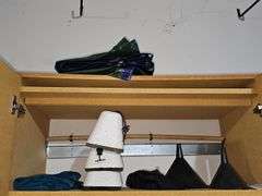 Cabinet contents as shown. Cabinet is not included.