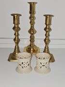 Three brass candlesticks and two Lenox tea lights