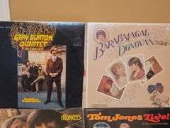 Grouping of albums by Gary Burton quartet, Isaac Hayes, The Monkees, and more. Stevie Wonder is an album insert with no album included by Stevie Wonder.