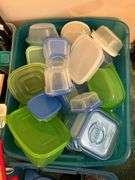 Tote full of plastic storage bowls