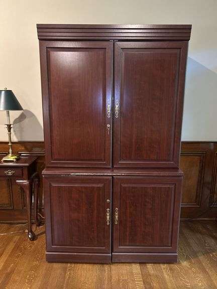 One-Piece cherry finish office center with key…..has blemish on bottom front edge (see pics)…..41-1/2 x 23 x 71-1/2 tall image