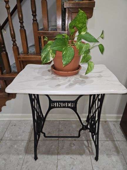 Vintage 29" tall cast iron Singer sewing machine stand w/30x19 cultured marble top PLANT INCLUDED... image