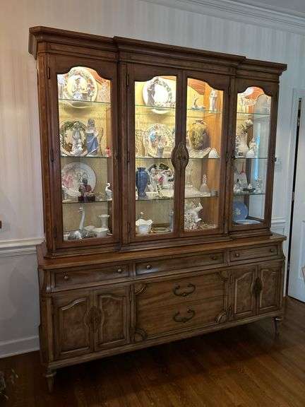Stunning maple(?) triple lighted breakfront with 3 small drawers, 2 large drawers and 2 side compartments….74 x 19-1/2 x 85 tall….could not move to determine if one piece or two….OTHER CONTENTS NOT INCLUDED image
