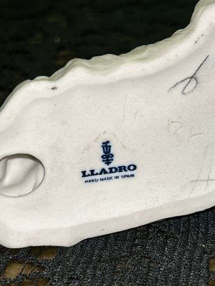 LLADRO Baby Jesus Sleeping on a Bed of Hay Bisque Porcelain Figurine (#4670)…..3-3/4” long x 2” tall…..part of the Children’s Nativity Series