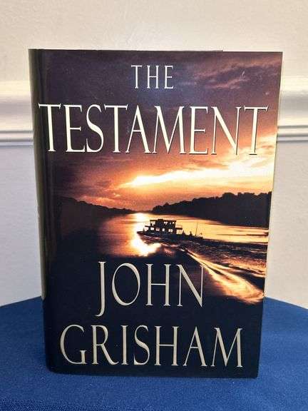 First Edition John Grisham “The Testament”hardback with gloss finish dust jacket…..in like new condition image