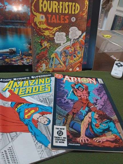 Set of three comics good condition have been stored in slaves.. Four Fisted Tales-Comic Consortium 1982, Orion #23 and Amazing Heroes #96 image