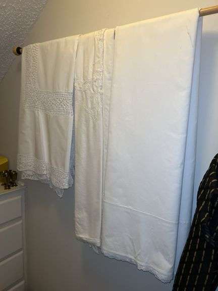 Very nice selection of (3) crochet-trimmed table linens….size is unknown but all have been dry-cleaned image