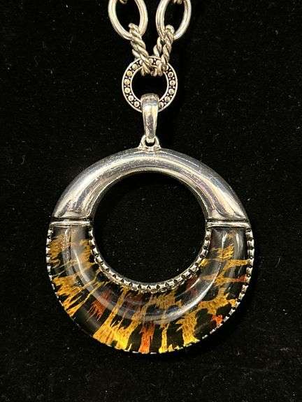 Link chain necklace with round silver tone and acrylic leopard print design pendant