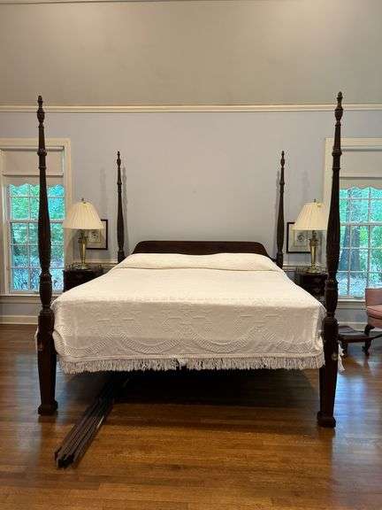 Mahogany finished king size 4-poster bed with carved posts…..includes all bedding…..must take all…..BUYER RESPONSIBLE FOR DISASSEMBLE AND REMOVAL image