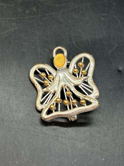 Beautiful grouping of angel brooches