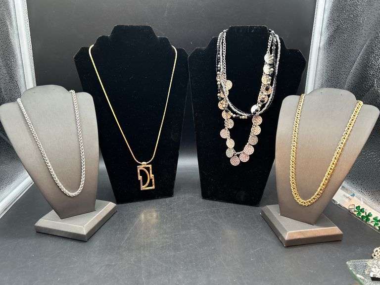 Gold and silver tone necklace grouping in various lengths image