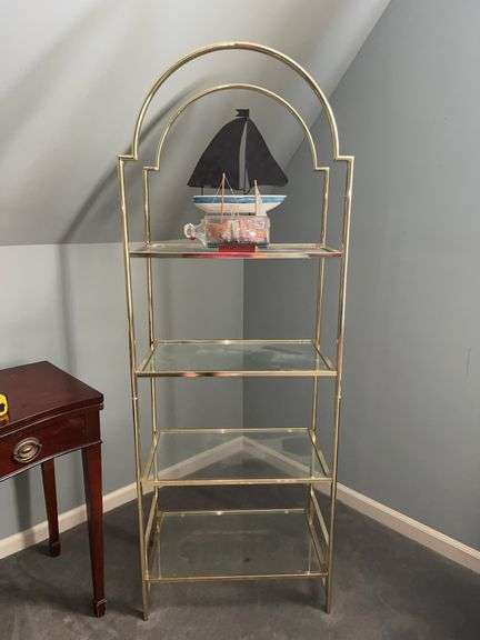 Gold-tone metal shelving unit with 4 glass shelves…..24-1/2 x 14-1/4 x 67-1/2 tall…..OTHER CONTENTS NOT INCLUDED image