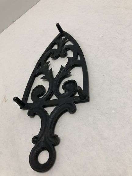 Vintage 1955 JZH Black Cast Iron Footed Trivet Cathedral T-12 R. 8.5 x 3.75”.