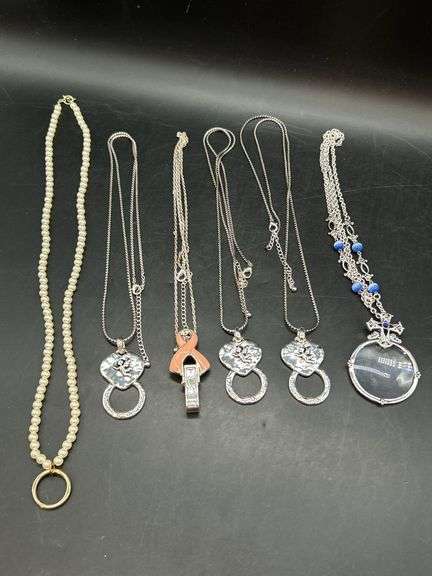 (5) very nice like new land yards and (1) great looking magnifying glass on beaded chain image